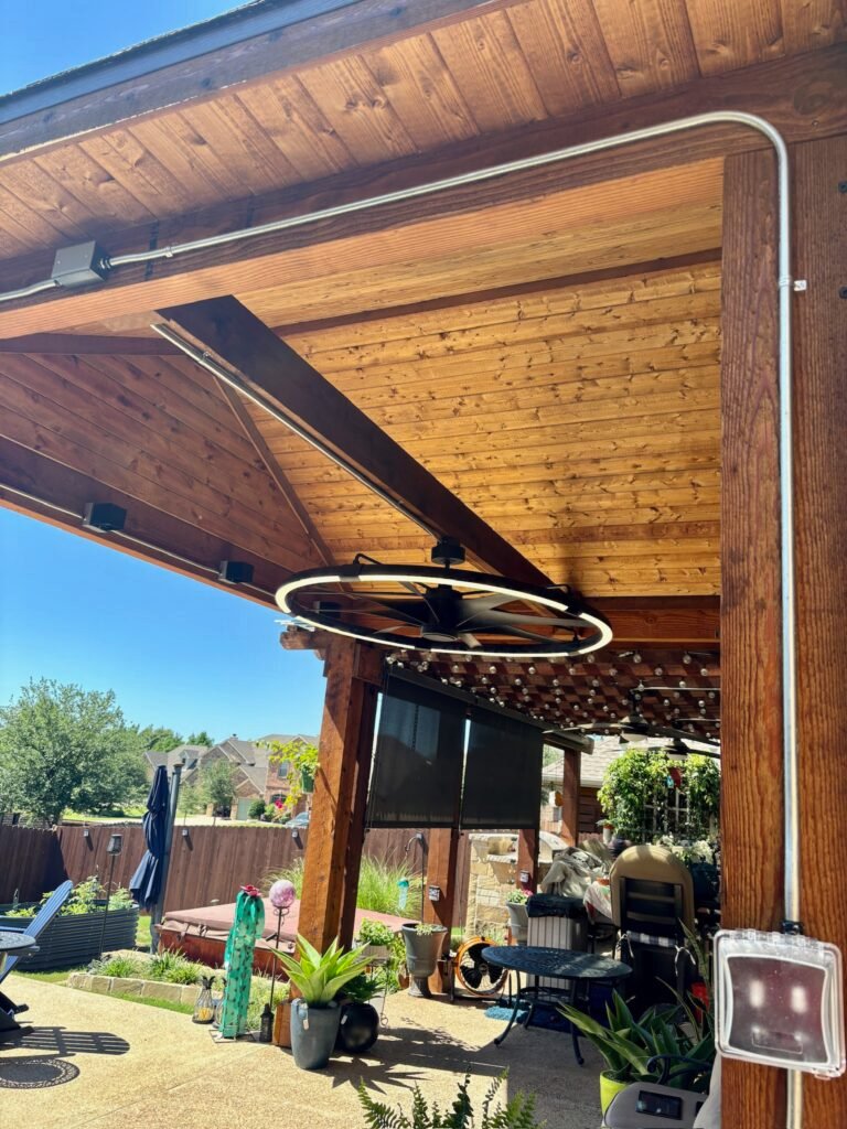 Clean residential patio electrical installation with outdoor wiring and outlets